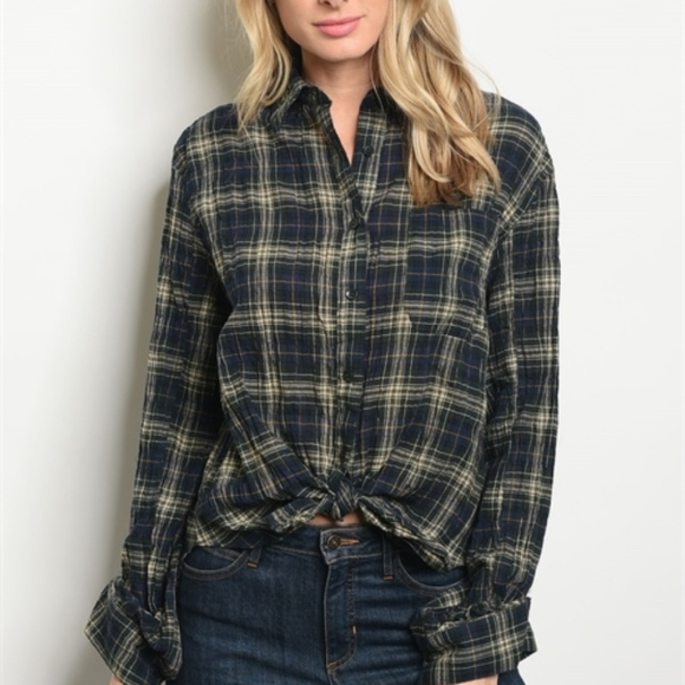 Long sleeve button down tie front plaid shirt.